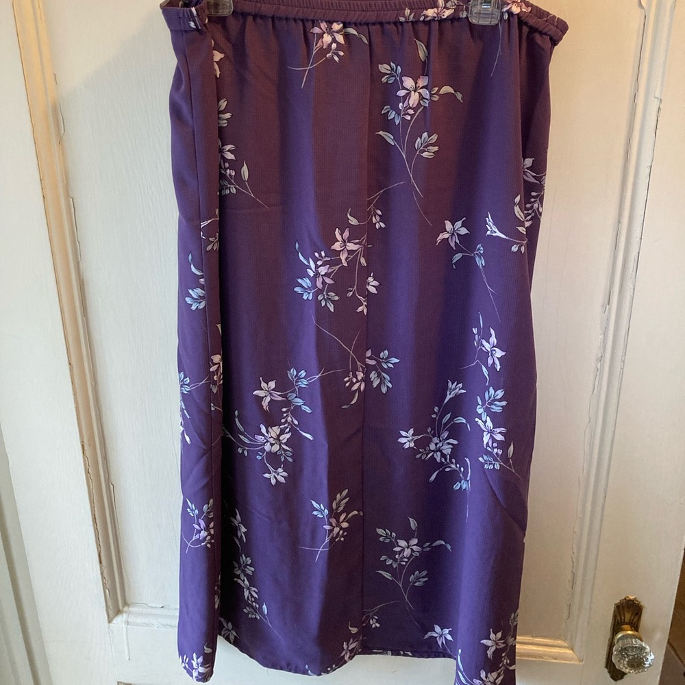 Purple with flowers skirt. Size L. Requirements